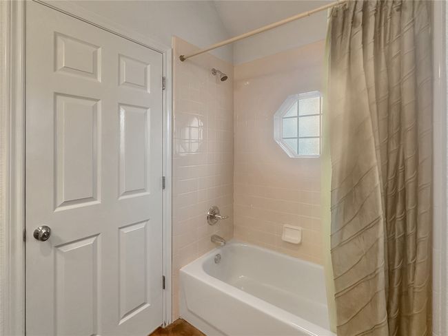 Bathroom featuring shower / bath combo | Image 14