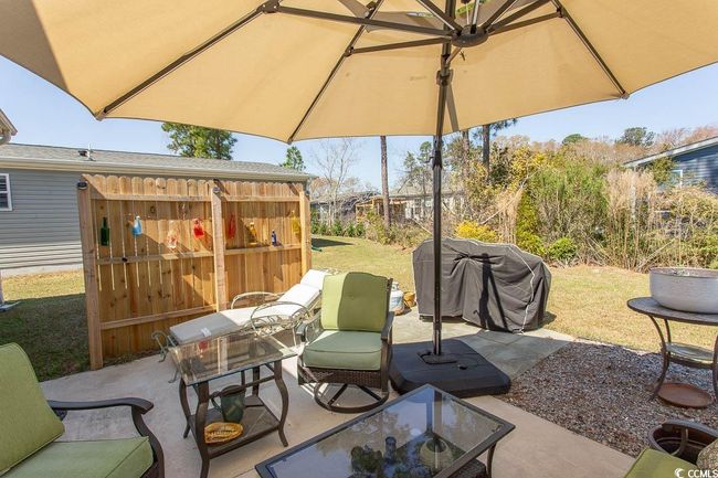 View of patio with area for grilling | Image 36