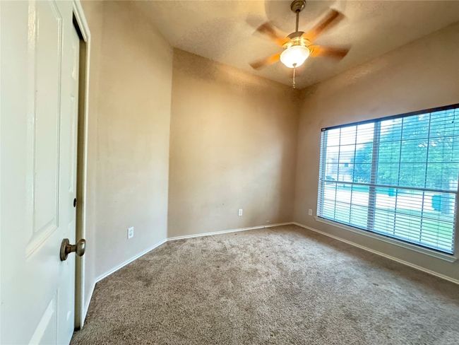 Empty room with carpet and a ceiling fan | Image 22