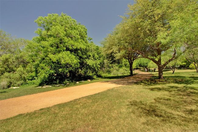 View of home's community featuring a yard | Image 27