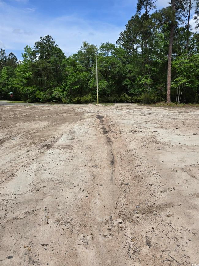 View of dirt / gravel road | Image 7