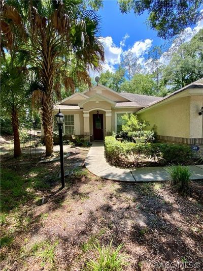 10063 Sw 192 Circle, House other with 3 bedrooms, 2 bathrooms and 2 parking in Dunnellon FL | Image 2