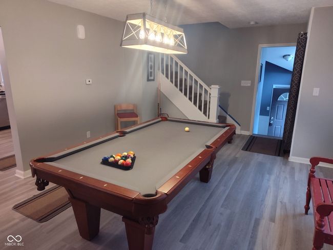 living room that can be used as a playroom, sitting area, or whatever suits your needs | Image 5