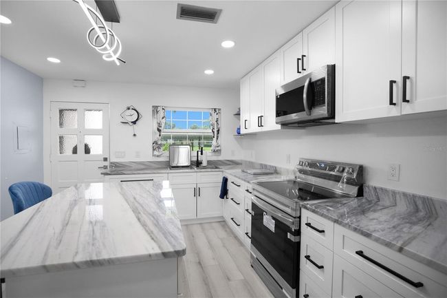 APT-33E - 1701 Pinehurst Rd, Condo with 2 bedrooms, 2 bathrooms and null parking in DUNEDIN FL | Image 11