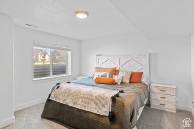 Bedroom with baseboards and carpet floors | Image 26