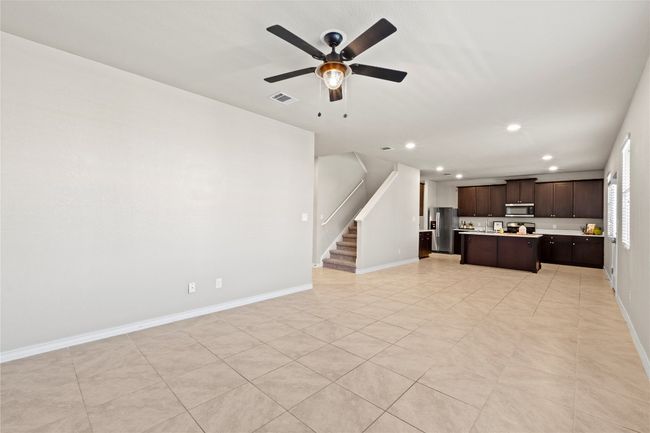 Another view of the large downstairs living area | Image 6