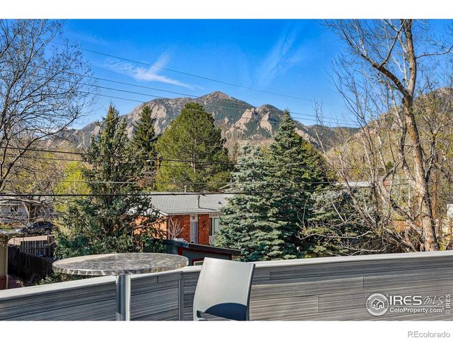 step onto the expanded deck-perfect for morning coffee or late-night stargazing, with stairs down to the hot tub. | Image 21