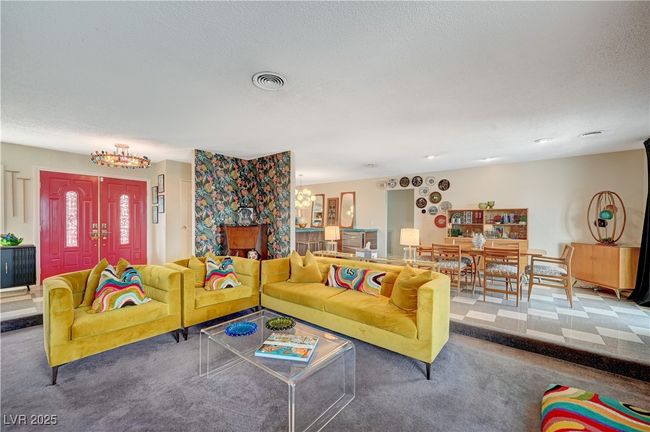 Living room featuring a textured ceiling, visible vents, and carpet flooring | Image 8
