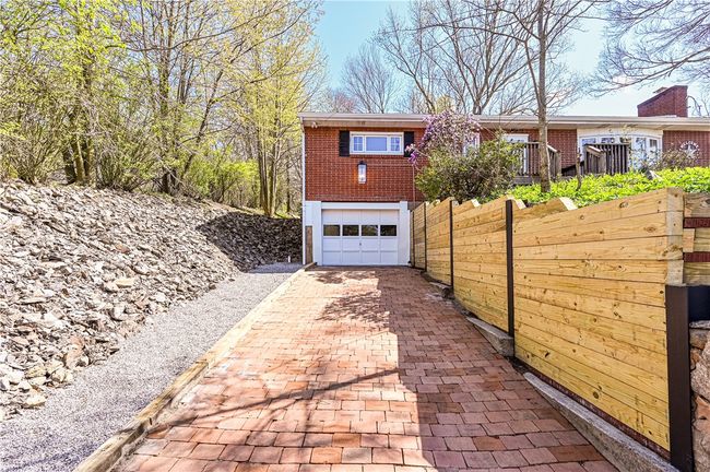 Lots of room for parking and check out the new retaining wall! | Image 24
