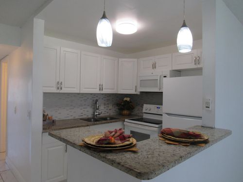 76 Cambridge D, West Palm Beach, FL, 33417-1313 | Card Image