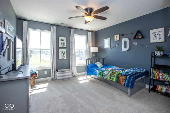 bedroom with carpet and ceiling fan | Image 18