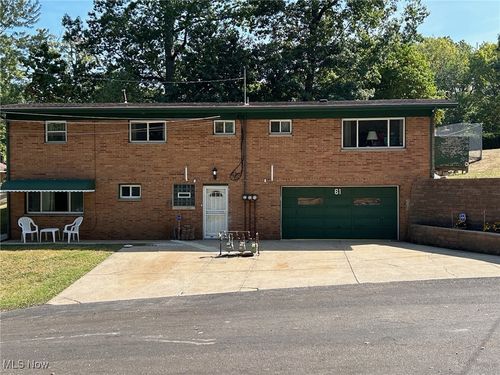61 Leicester Dr, Coventry Township, OH, 44319-1854 | Card Image