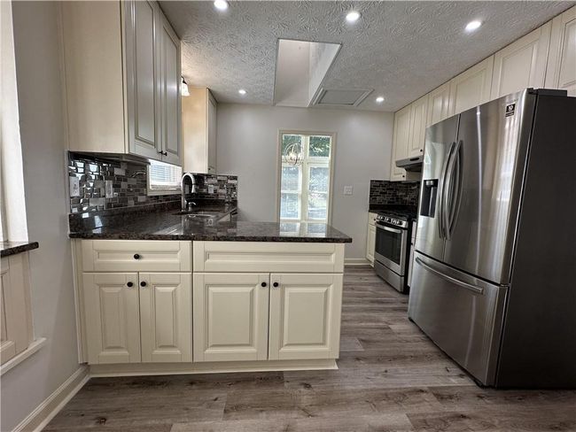 3559 Sawmill Ter, House other with 4 bedrooms, 3 bathrooms and null parking in Marietta GA | Image 8