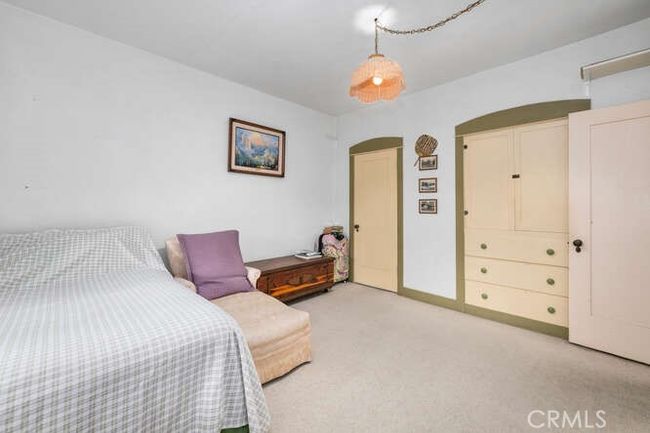 Master bedroom view with walk-in closet | Image 26