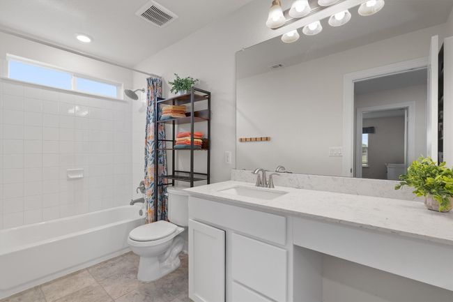 Full bathroom with vanity and shower / bathtub combination with curtain | Image 26