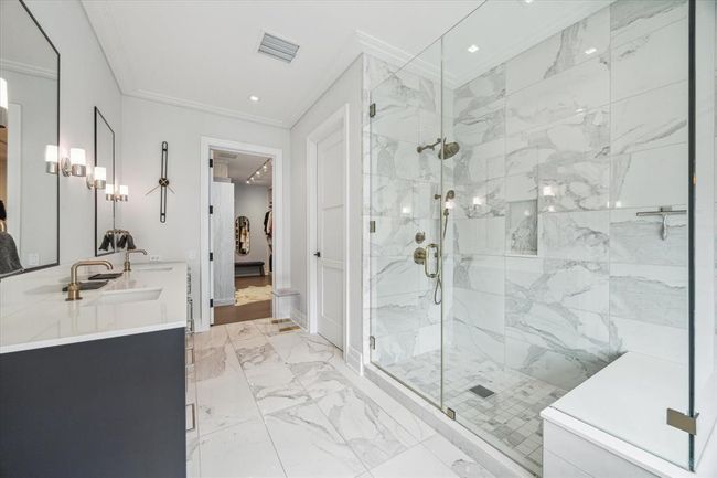 [Primary Bath] You will appreciate the luxury! Featuring oversized shower with niche bench, water closet behind door | Image 22
