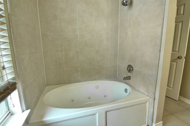 Bathroom with tile patterned flooring | Image 16