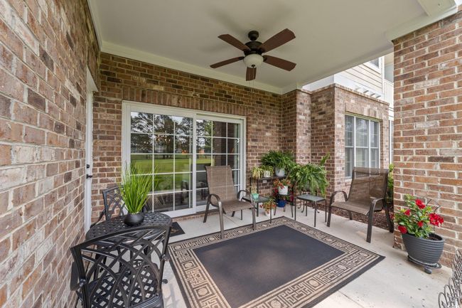 View of patio featuring ceiling fan | Image 15