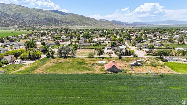 Aerial perspective of suburban area with a mountain backdrop | Image 5