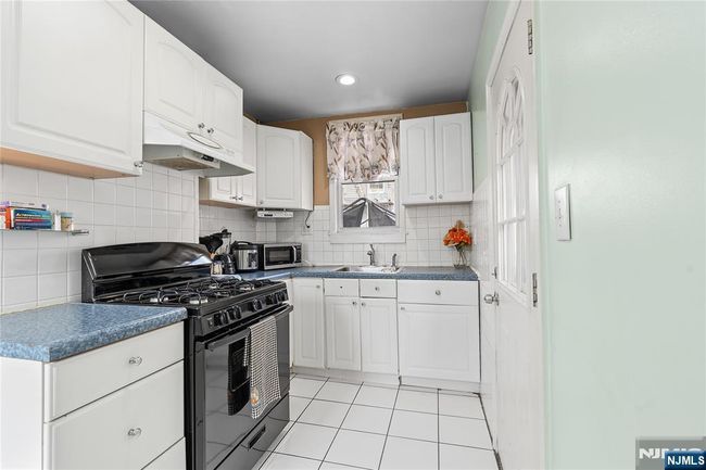 1010 Paterson Plank Rd, Home with 6 bedrooms, 3 bathrooms and null parking in North Bergen NJ | Image 14