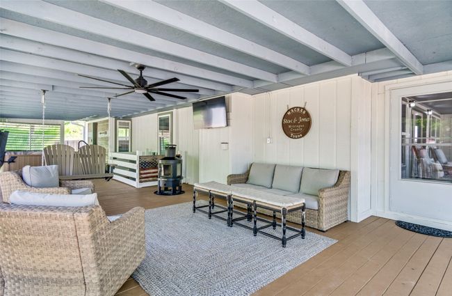 Cozy up on the large deck overlooking lake | Image 21