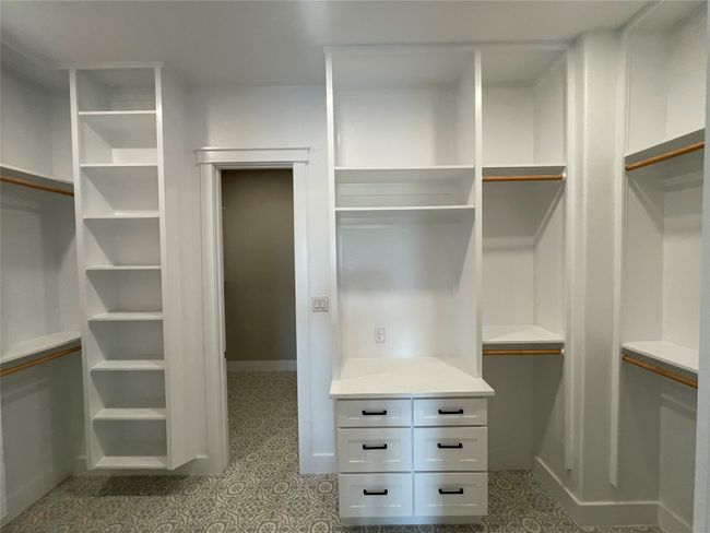 View of walk in closet | Image 24