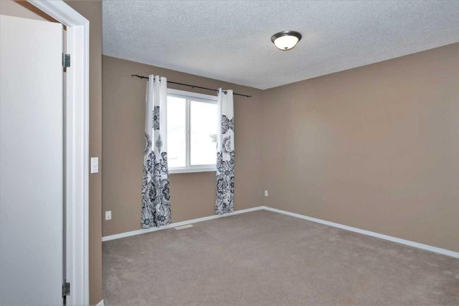 121 Tuscany Springs Gardens Nw, Home with 2 bedrooms, 2 bathrooms and 2 parking in Calgary AB | Image 12