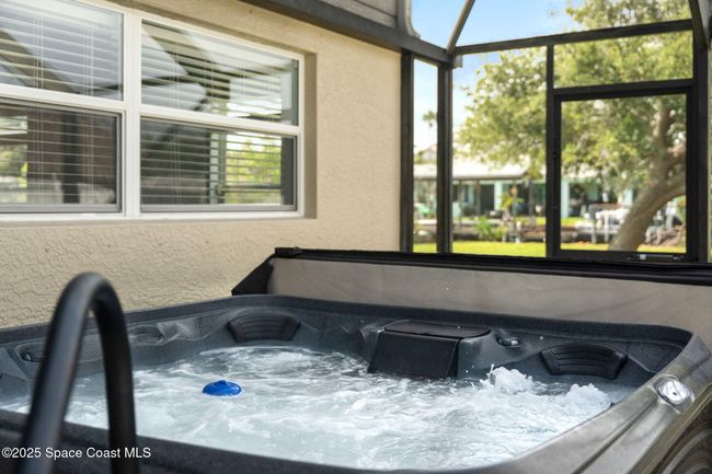Spa in screened Patio | Image 53