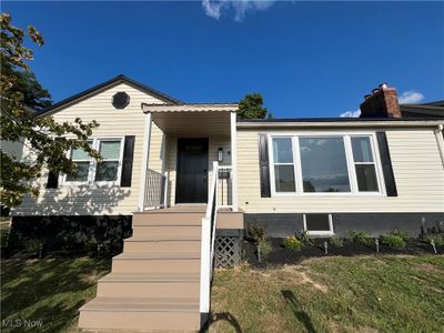 View of front of home with a front lawn | Image 1