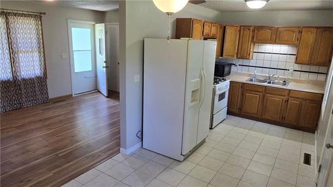 Kitchen/Dining area facing front door | Image 10