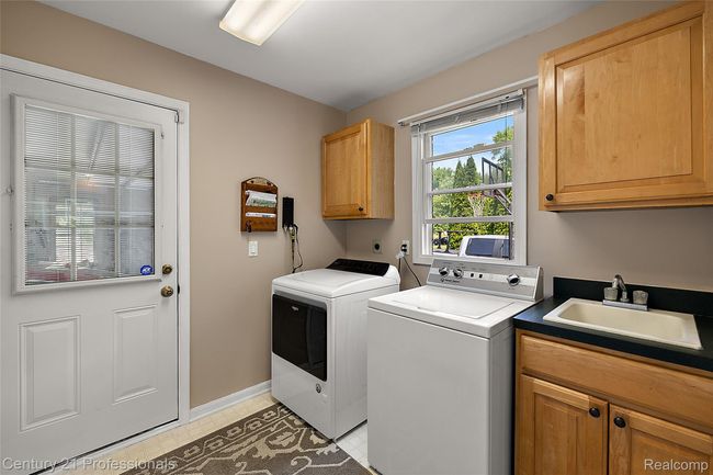 Laundry room on main level | Image 49