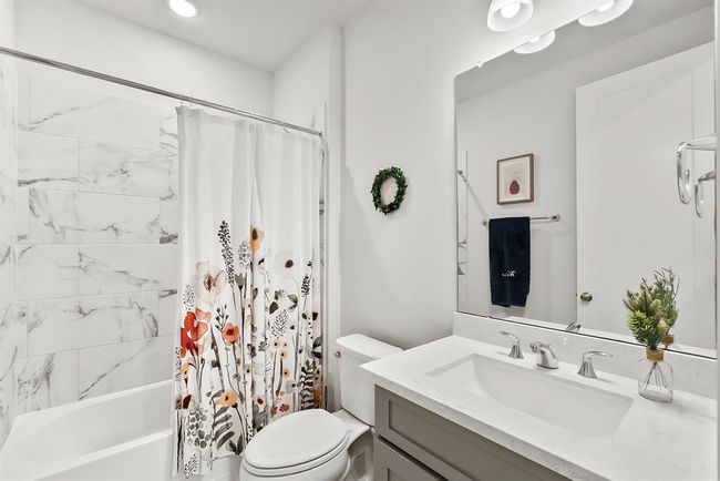 Full bathroom located downstairs and easy access for the secondary bedroom or guests. | Image 21