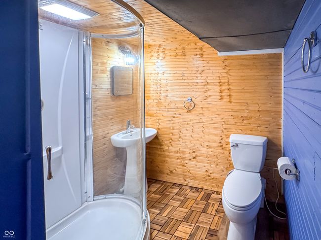bathroom with wooden walls | Image 43