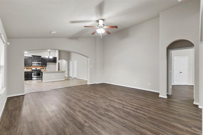 Open floor concept, view from family room towards the kitchen and breakfast area | Image 16