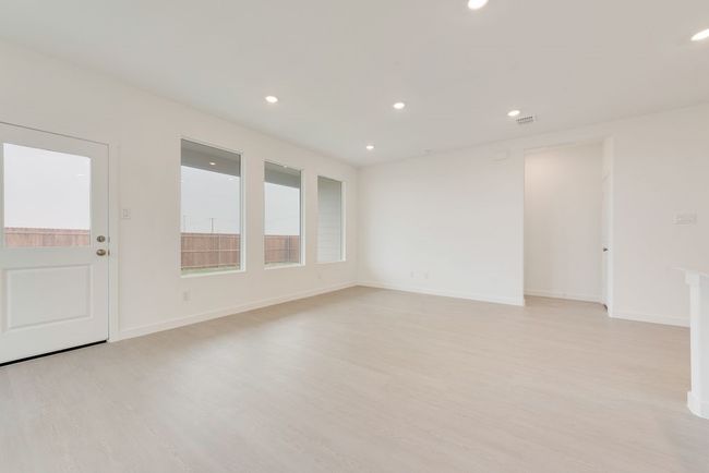 Spare room with recessed lighting, light wood finished floors, and baseboards | Image 4