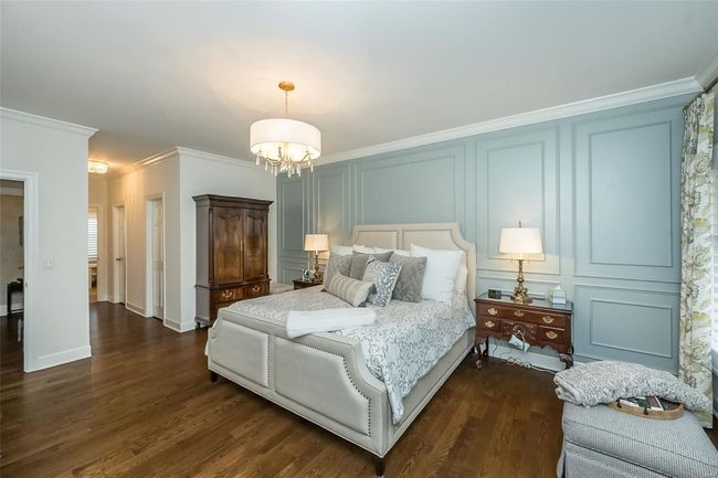 Beautiful and spacious primary bedroom on the main floor | Image 30