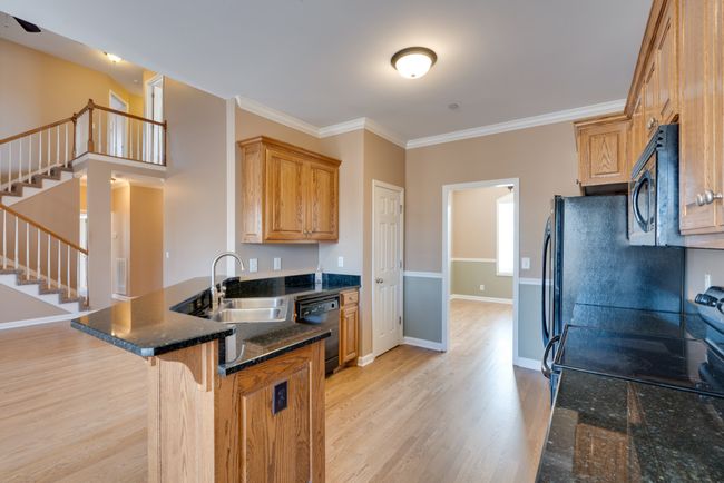 Double, stainless steel sink with all appliances included in purchase. | Image 16