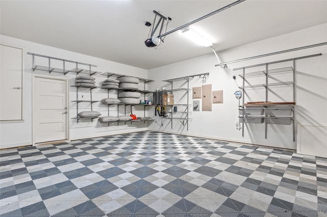 Garage with a garage door opener | Image 31