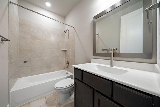 2nd full bathroom located on the first floor features a tub/shower combo. | Image 22