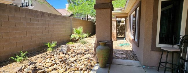 View of fenced backyard | Image 7