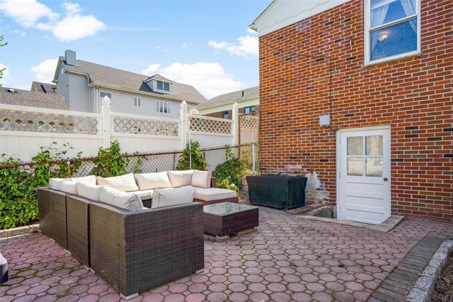 View of patio / terrace with an outdoor hangout area | Image 23