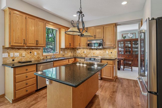 Functional open kitchen with stainless steel appliances | Image 4