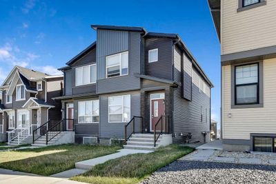 28 Edith Gate Nw, Home with 4 bedrooms, 3 bathrooms and 2 parking in Calgary AB | Image 1