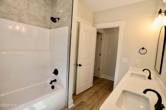 Main level bath w/tub & shower + double sinks | Image 31