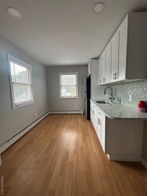 30 Dean St, North Babylon, NY, 11703-4104 | Card Image