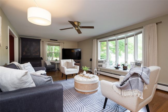 hardwood floors lead to the dining room | Image 5