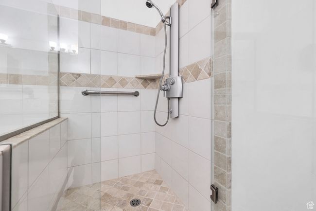 Full bath featuring tiled shower | Image 17