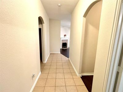 Hall featuring light tile patterned floors | Image 2