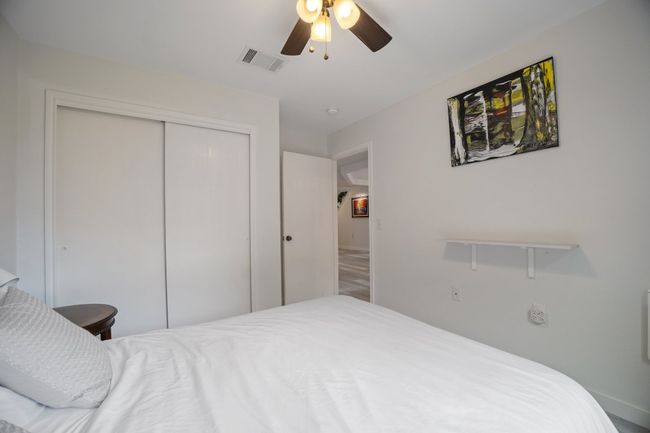 Bedroom featuring a closet and a ceiling fan | Image 17