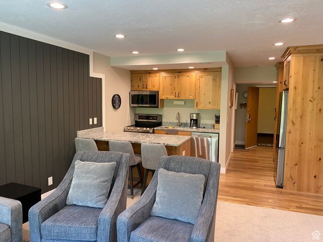 Kitchen featuring appliances with stainless steel finishes, open floor plan | Image 7